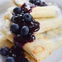 Creamy Crepes with Berry and Blueberry Sauce